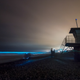 Glowing phytoplankton light up the waves near Torrey Pines Beach on Tuesday.